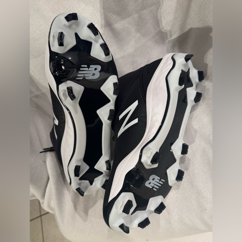 New Balance Black and White Cleats